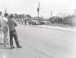 Photograph of a tow truck in the mud, Henderson, July 1954