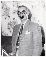 Photograph of Dr. Nelson wearing a costume at a cocktail party, Henderson, Nevada, 1956