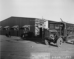 Photograph of a truck outside of the McNeil Construction Company temporary office at Basic Magnesium, Inc.