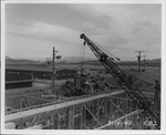Photograph of concrete pouring on a roof deck