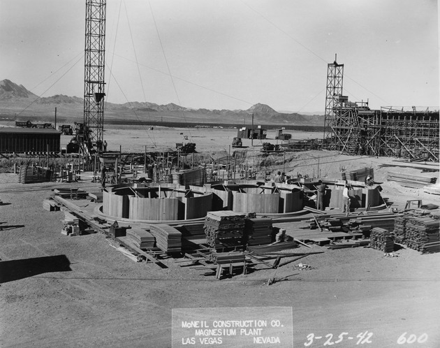 Photograph of magnesite storage silos under construction at Basic Magnesium, Inc.