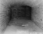 Photograph of a brick-lined tunnel
