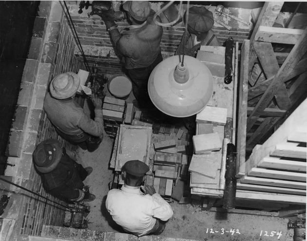 Photograph of a brick structure under construction