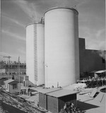 Photograph of magnesium oxide silos at Basic Magnesium, Inc.