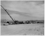Photograph of a crane and vehicles at Basic Magnesium, Inc.