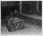 Photograph of men at work at the Basic Magnesium, Inc. machine shop