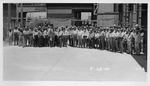 Photograph of a group of men on an inspection tour at Basic Magnesium, Inc.