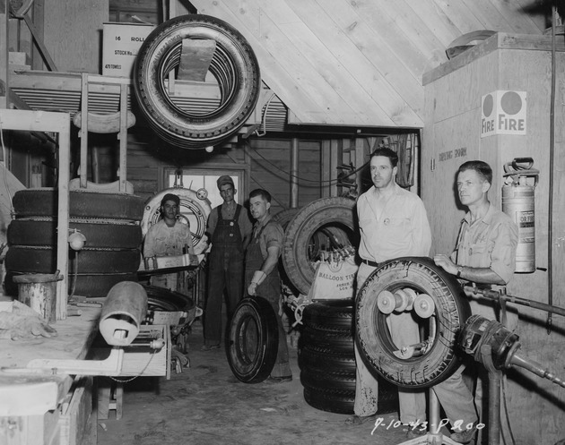 Photograph of men at work at the Basic Magnesium, Inc. tire shop
