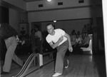 Photograph of a bowler at the Basic Magnesium, Inc. townsite bowling alley