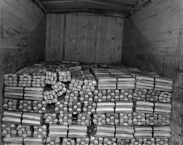 Photograph of magnesium ingots in a railroad car at Basic Magnesium, Inc.