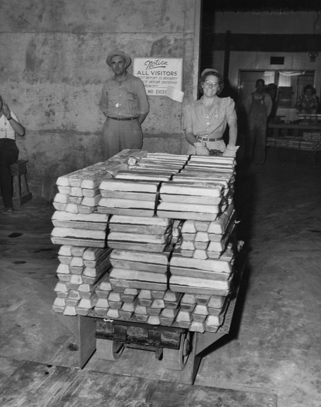 Photograph of magnesium ingots on a cart at Basic Magnesium, Inc.