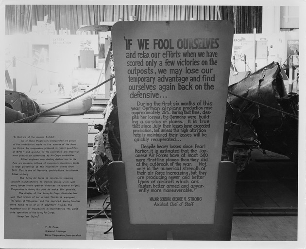 Photograph of the Aviada exhibition at Basic Magnesium, Inc., signs
