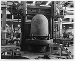 Photograph of a crucible in a machine shop of bricks at Basic Magnesium, Inc.
