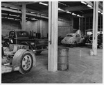 Photograph of automobiles in a garage at Basic Magnesium, Inc.