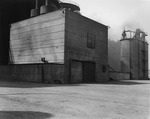 Photograph of a pulverizer building and conveyor at Basic Magnesium, Inc.
