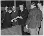 Photograph of Senator Pat McCarran visiting the Basic Magnesium, Inc. plant