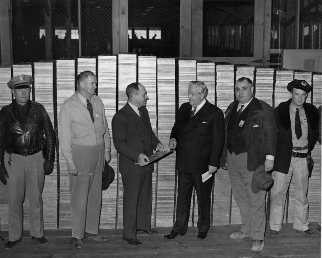 Photograph of Senator Pat McCarran visiting the Basic Magnesium, Inc. plant