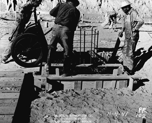 Photograph of a cell building under construction at Basic Magnesium, Inc.