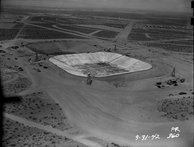 Aerial photograph of the reservoirs under construction at Basic Magnesium, Inc.