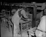 Photograph of men and masonry saws at Basic Magnesium, Inc.