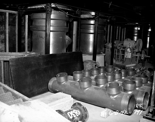 Photograph of acid towers and heaters