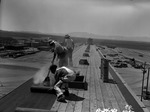 Photograph of roof installation on a peat storage building