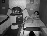 Photograph of Charlene Creger in her dormitory room at Basic Magnesium, Inc.
