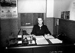 Photograph of a secretary at Basic Magnesium, Inc.