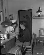 Photograph of a nurse and first aid at Basic Magnesium, Inc.
