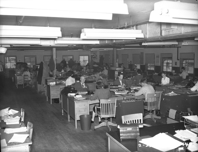 Photograph of office workers at Basic Magnesium, Inc.