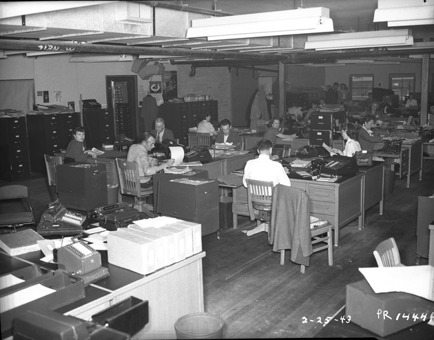 Photograph of office workers at Basic Magnesium, Inc.