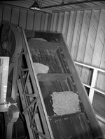 Photograph of a conveyor belt at Basic Magnesium, Inc.