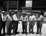 Photograph of a group of men at Basic Magnesium, Inc.
