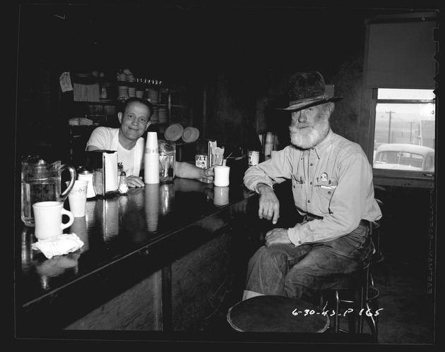 Photograph of Eddie Wright and Ralph H. Brown at a canteen