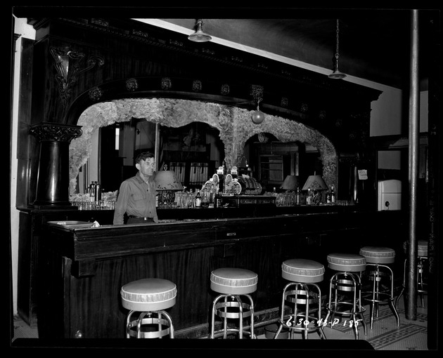 Photograph of a man in a bar