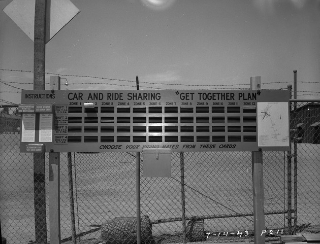 Photograph of a sign advertising car and ride sharing at Basic Magnesium, Inc.