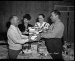 Photograph of book donations for the Basic Magnesium, Inc. townsite library