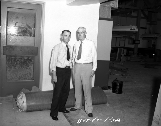 Photograph of Bill Treweek and Harry J. MacSherry at Basic Magnesium, Inc.