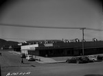 Photograph of the Basic Magnesium, Inc. townsite drugstore and barber shop