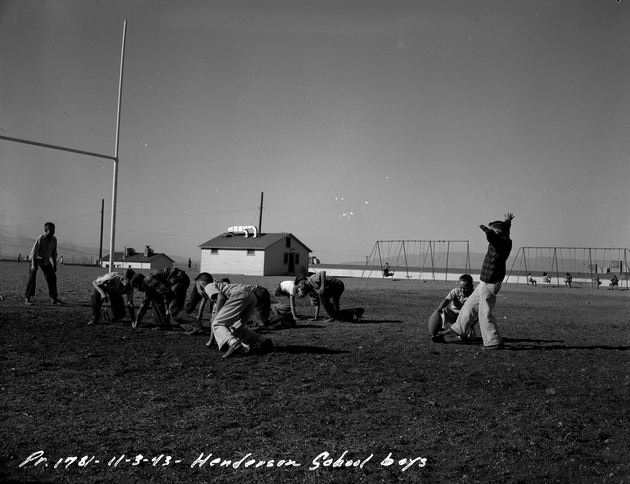 Photograph of school boys playing football