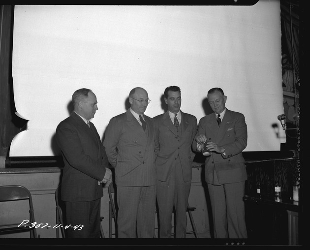 Photograph of F. O. Case, H.G. Satterthwaite, Mr. Struthers, and Mr. Wasksmuth at Basic Magnesium, Inc.