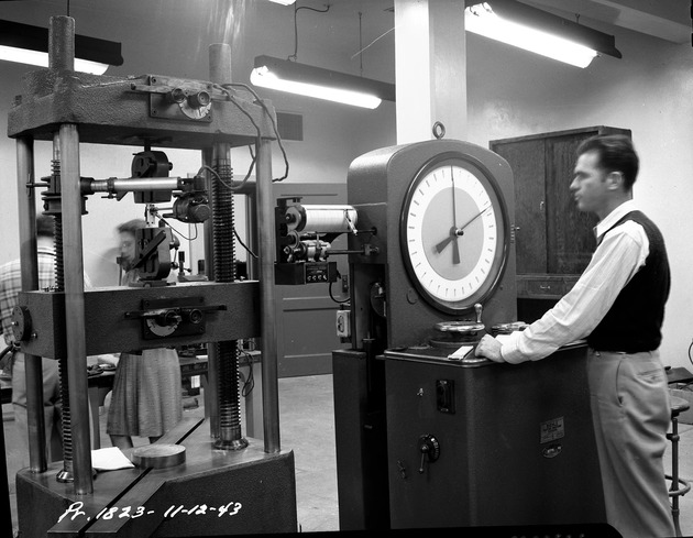 Photograph of a man at work at the Basic Magnesium, Inc. technical laboratory