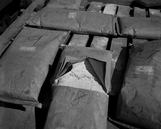Photograph of a defective flux sack at Basic Magnesium, Inc.