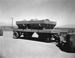 Photograph of a two-hopper pellet truck at Basic Magnesium, Inc.