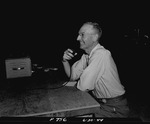 Photograph of Jay Robinson broadcasts a softball game from Basic Magnesium, Inc.