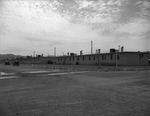 Photograph of housing and cars at Victory Village