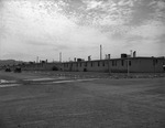 Photograph of housing and cars at Victory Village