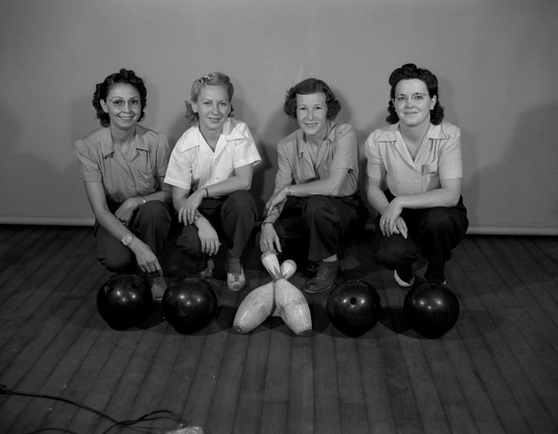 Group portrait of the Lucky Strikes bowling team