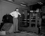 Photograph of C.H. Mahoney and rolling mill at Basic Magnesium, Inc.