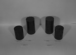 Photograph of synthetic rubber cylinders at Basic Magnesium, Inc.